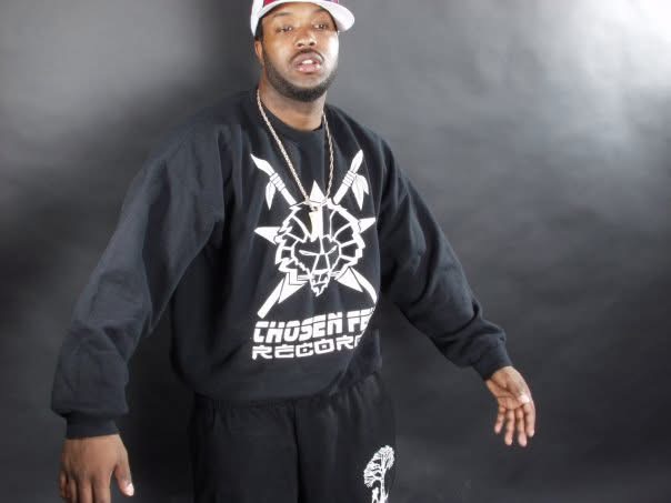Shortlord holding Chosen Few Records sweatshirt
